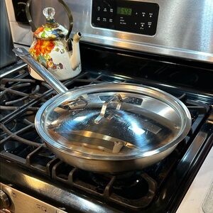 Vollrath Centurion Stainless Steel Frying Pan with Lid 13-1/2”x 3”.